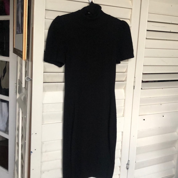 Black sweater dress with turtleneck. - Picture 1 of 4